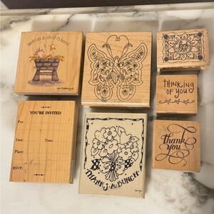 Lot of 7 wooden rubber stamps.